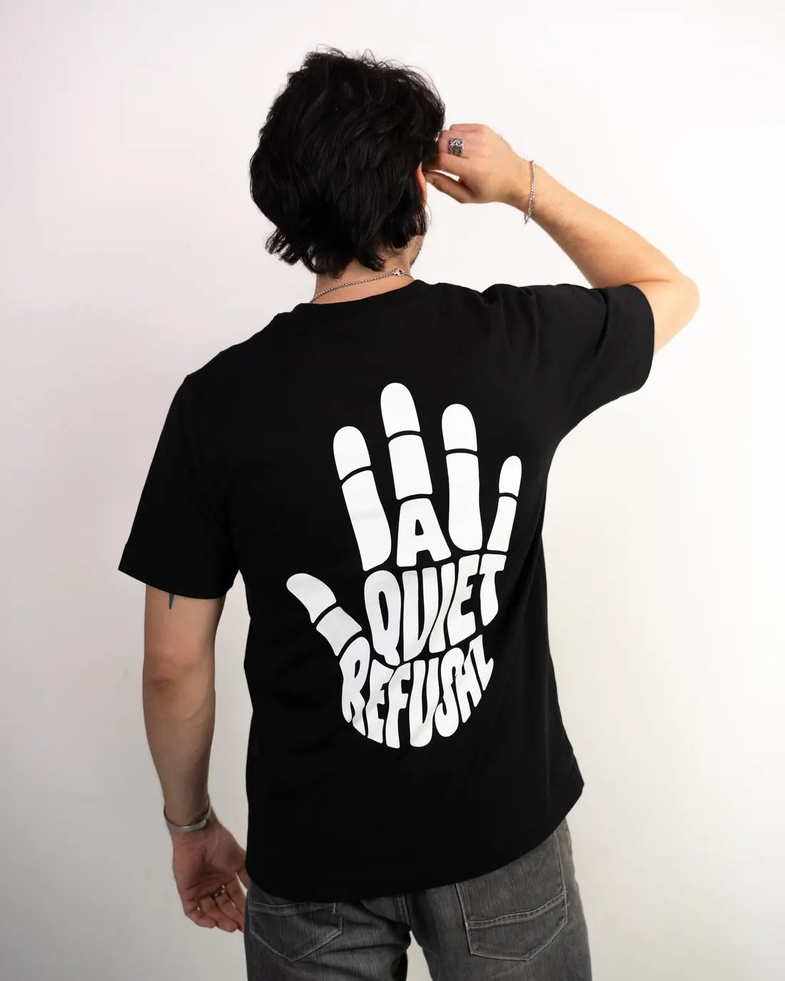 A QUIET REFUSAL, worn, back